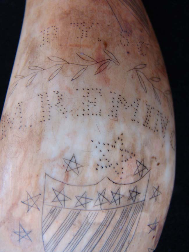 A pair of 19th century scrimshawed whales' teeth dating to 1869 — image 4